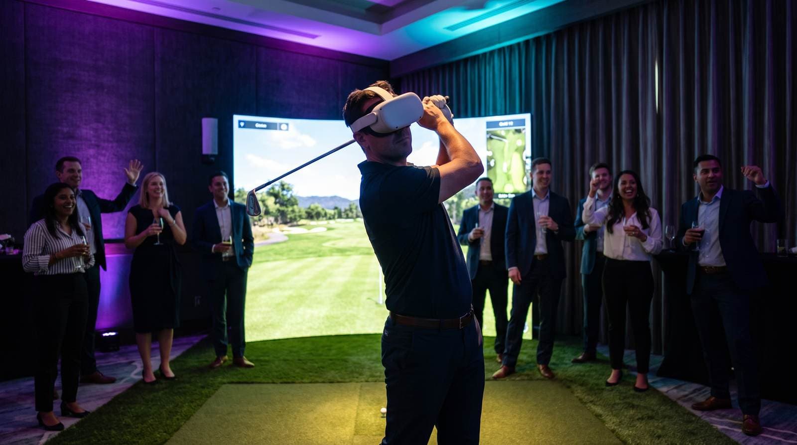 Guest playing VR golf at a corporate event